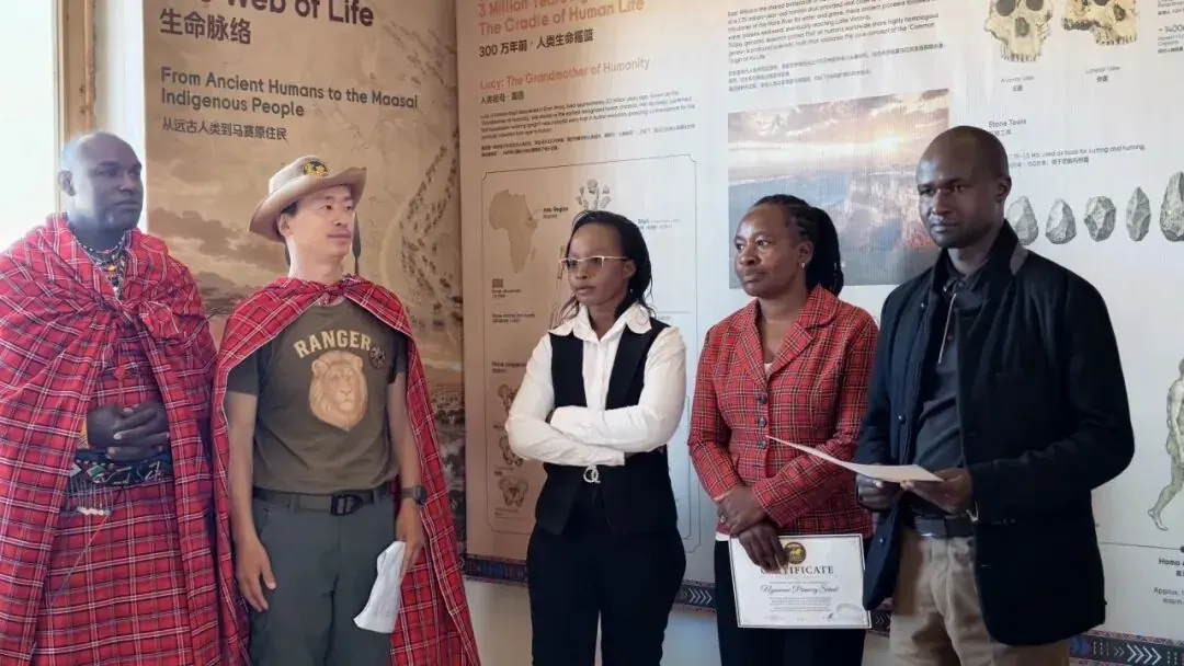 Simba with Maasai elders and guests